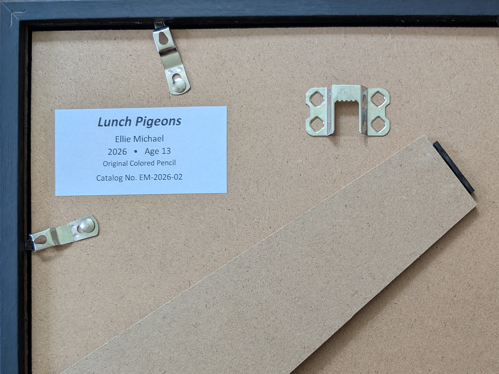 Sample permanent catalog label attached to the back of an artwork